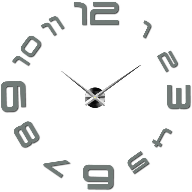 Un ceas de perete cu un cadran mare, unde numerele sunt lipite direct pe perete.