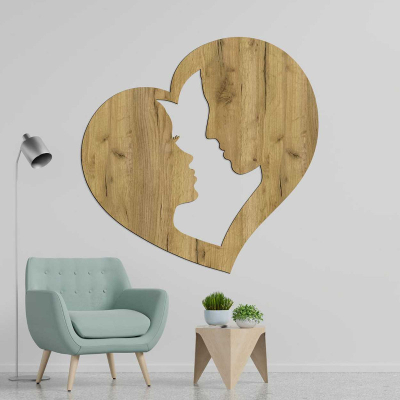 Decorațiune care înfățișează silueta unui bărbat și a unei femei în profil, închise într-o singură inimă.