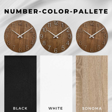 Ceas din lemn sculptat, cu cadran simplu și design minimalist. Ceas din lemn sculptat, cu cadran simplu și design minimalist.