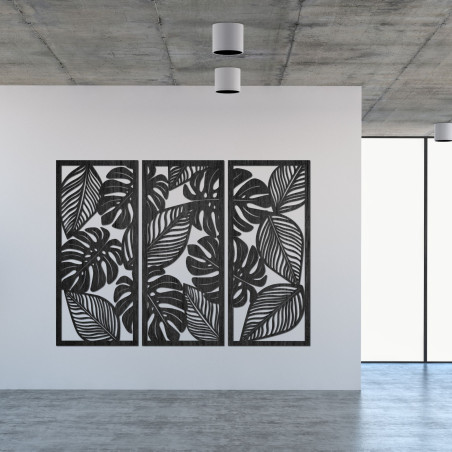 Decorațiune murală modernă: trei panouri cu decupaje din frunze de monstera.