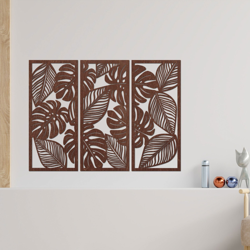 Decorațiune murală modernă: trei panouri cu decupaje din frunze de monstera.