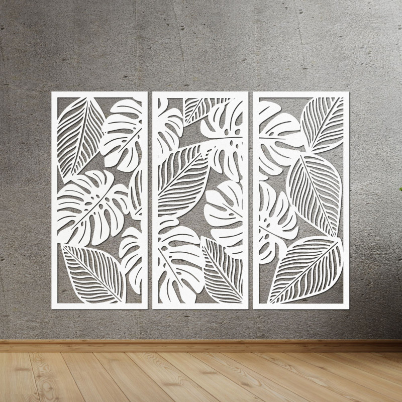 Decorațiune murală modernă: trei panouri cu decupaje din frunze de monstera.